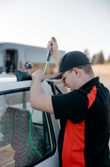 Quincy McGrail unlocking a car door for a customer in Billings, MT